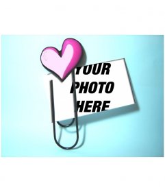 Create your custom postcard love with this simple photo frame in which a clip with a heart attached a photograph of your choice on a light blue background