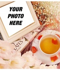 Photo frame with flowers to put your picture with rose petals and a cup of tea