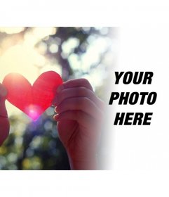 Photomontage of love with a red paper heart and forest background blur on the photo you upload